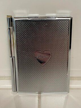 Brighton mirror and notepad and pen